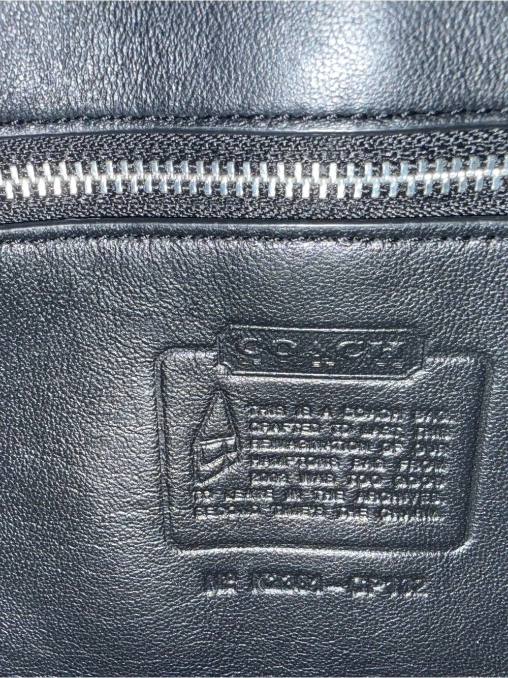 Coach Hampton’s Black Leather Shoulder Bag with Silver Clasp
